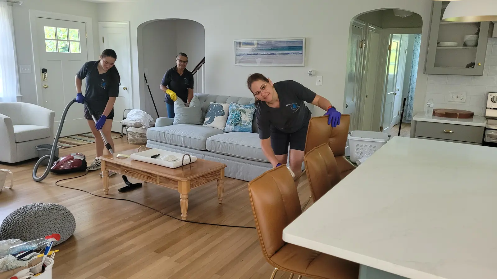 Sherlock Holmes Cleaning crew doing house cleaning in a Cape Cod, MA living room
